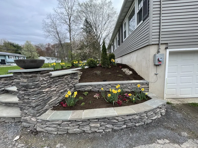 Mulch and landscape bed work by Ardisi Landscaping